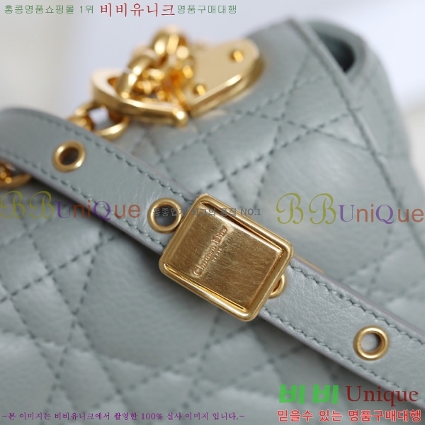 # ̴ īι M122500-4