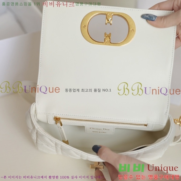 # ̴ īι M122500-1