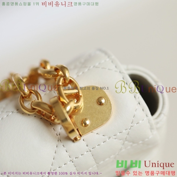 # ̴ īι M122500-1